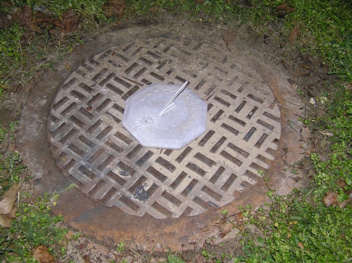 I did not have to go far to take this picture. I have a manhole in my front yard.
