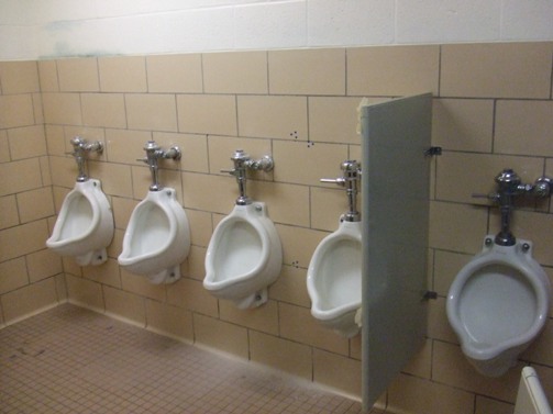 What were they thinking when they installed these urinals?  In order to use them, people would be have to be pressed shoulder-to-shoulder.  Ack!
