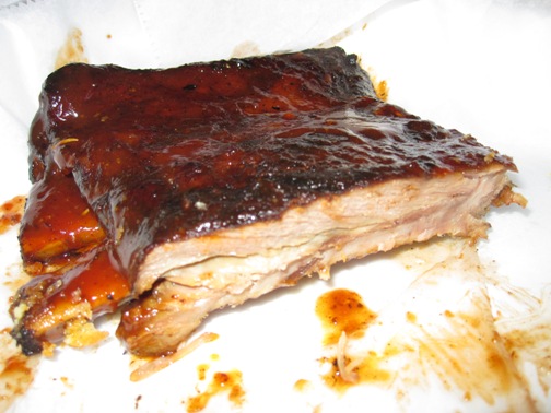 A half rack of pork ribs with Kansas City Sweet barbecue sauce.  (You can choose your sauce.)
