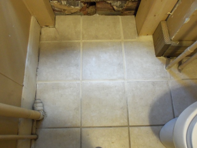 The old grout is dirty.  I need to clean it.