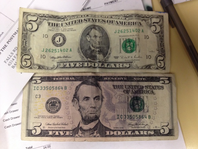 The one on the top looks so weird.  Its like play money or something.