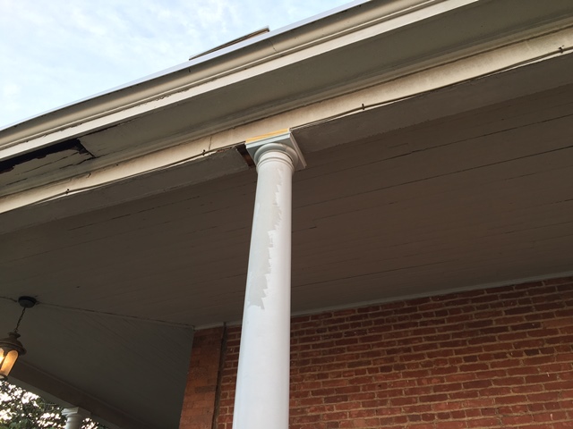 The painted portion of this column is the lighter looking part.  It looks really white compared to the porch roof, but it's not.