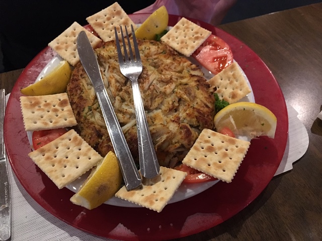 The knife and fork look tiny, but they are normal size.  The crab cake is HUGE!