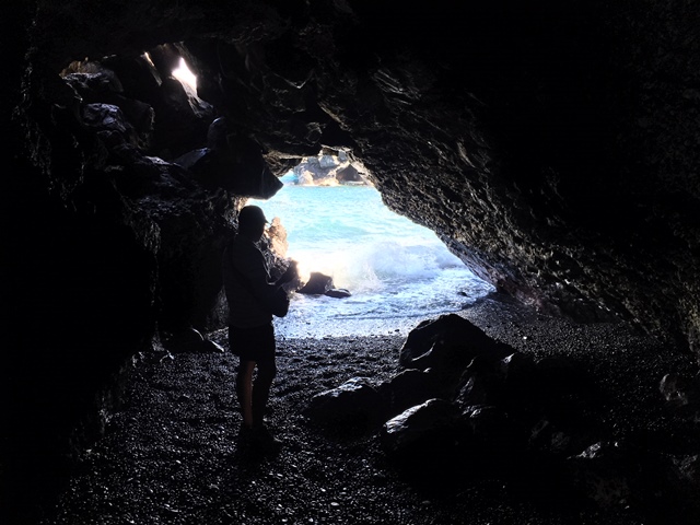 The cave was dark, and the sun was bright.  