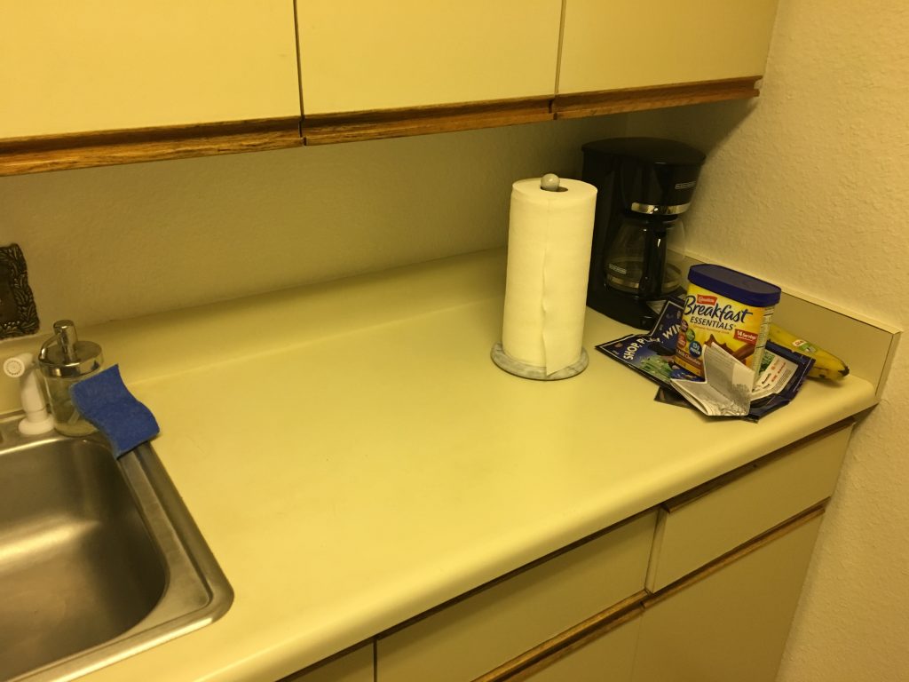 I wont leave the paper towels there.  I just shoved them over to clean off the counter. 